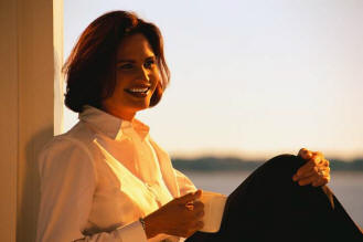 Professional Woman relaxing instead of paying bills